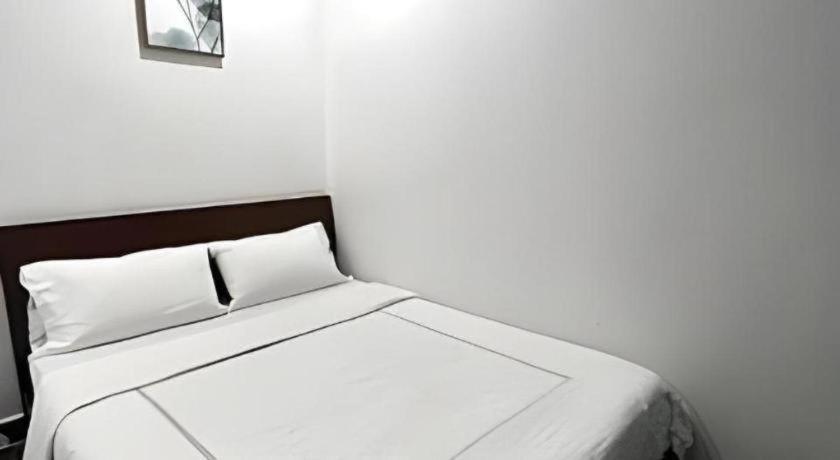 Oyo 90936 Hotel Manjoi Inn ايبوه المظهر الخارجي الصورة